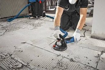 a man is doing surface preparation