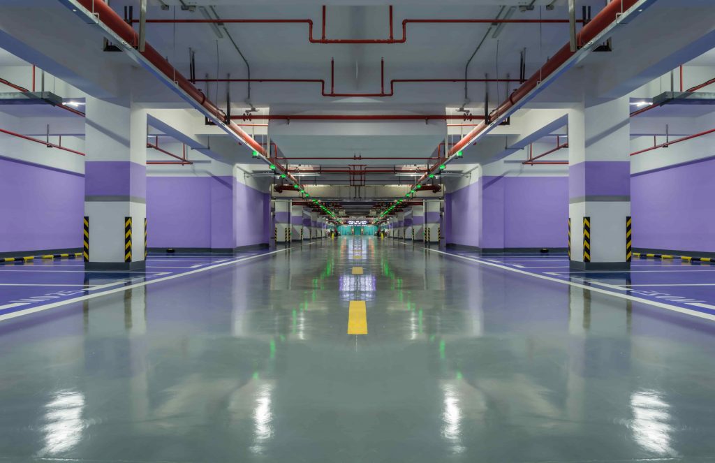 Big Garage with purple walls and epoxy flooring