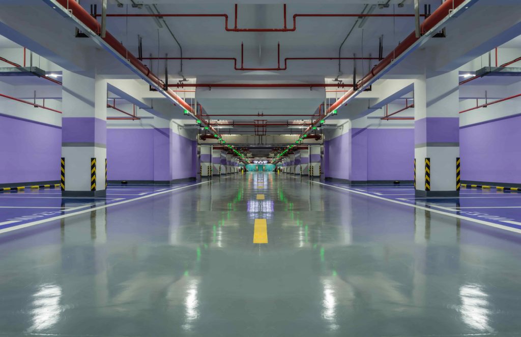 Big Garage with purple walls and epoxy flooring