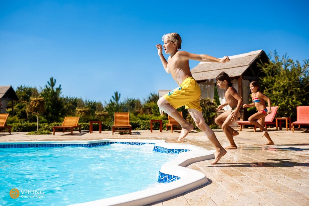 children running on non-slip pool deck area In and near Prairieville, LA