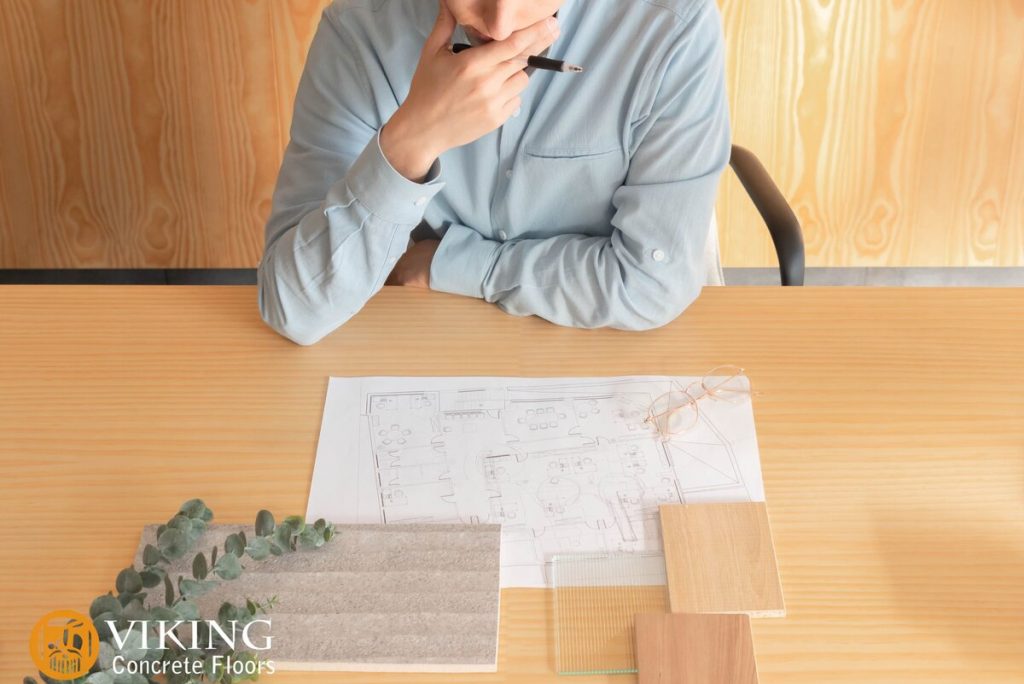 A man considers which flooring is suitable for his design in & near Prairieville, LA