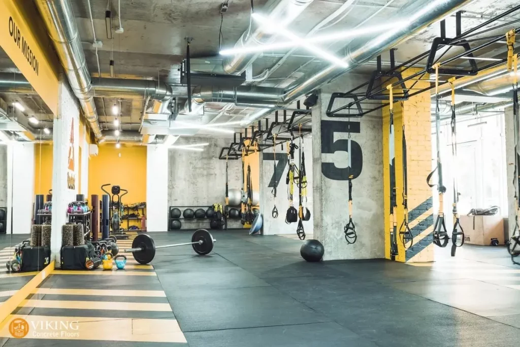 Gym with concrete flooring under rubber mat in Prairieville, LA